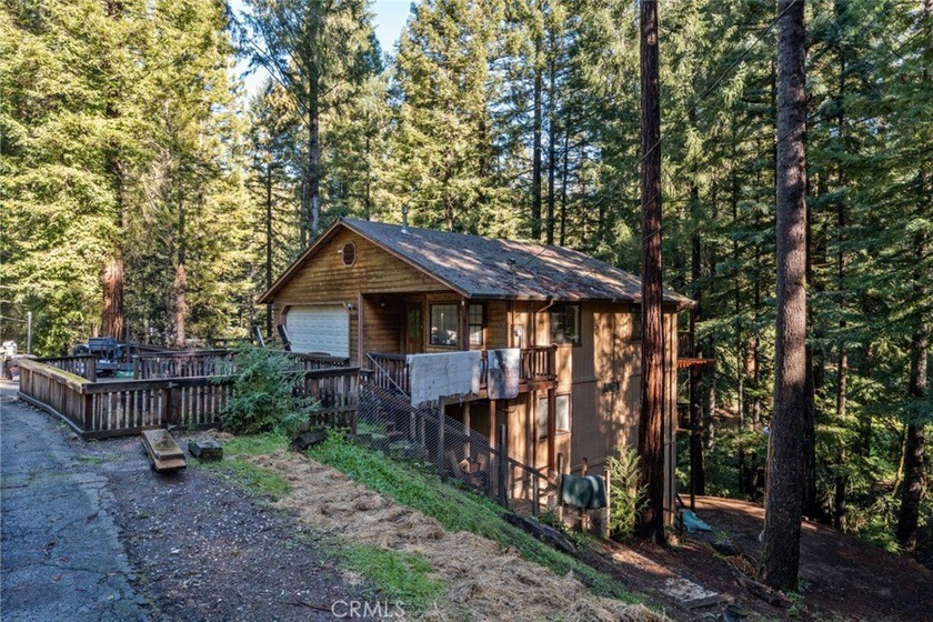 This inviting 3-bedroom, 2.5-bath home offers rare privacy with - Beach Home for sale in Willits, California on Beachhouse.com