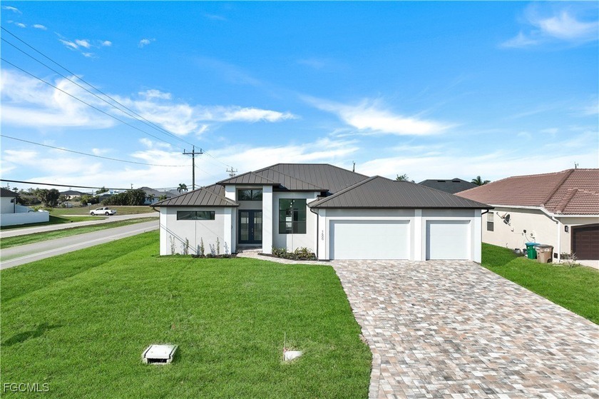 Step inside this beautifully designed 3-bedroom plus den, 3-bath - Beach Home for sale in Cape Coral, Florida on Beachhouse.com