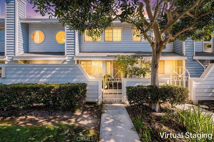 Located within the gated community of Seawind Cove, this - Beach Condo for sale in Huntington Beach, California on Beachhouse.com