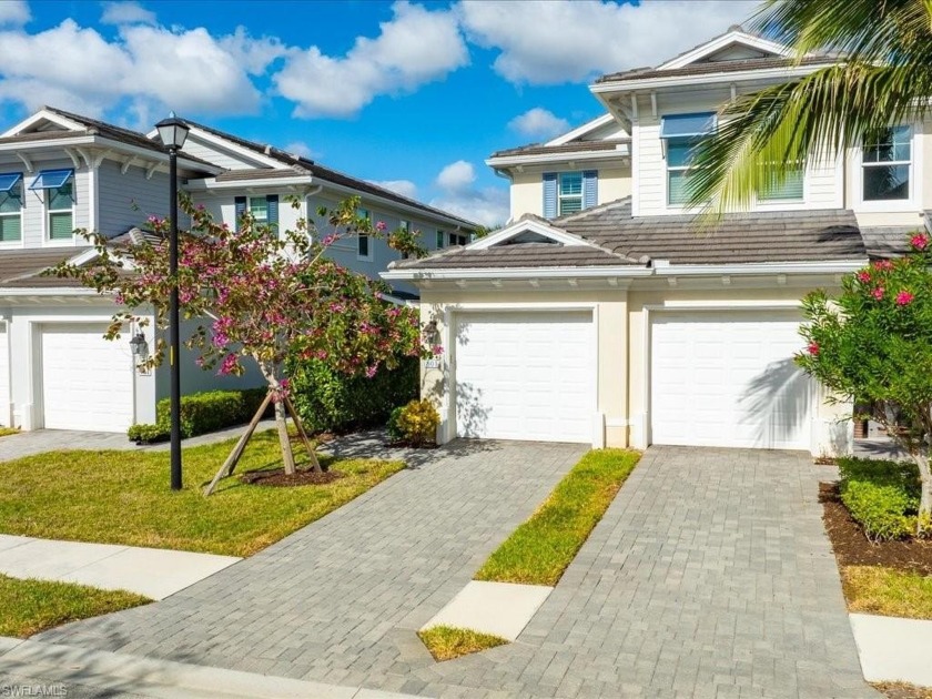 Tranquil Lakefront Living in this Bright and Spacious End-Unit - Beach Home for sale in Naples, Florida on Beachhouse.com