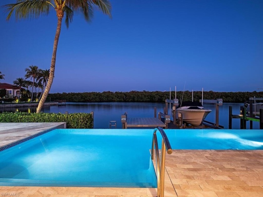 Prepare to be mesmerized by the breathtaking wide-water views of - Beach Home for sale in Naples, Florida on Beachhouse.com