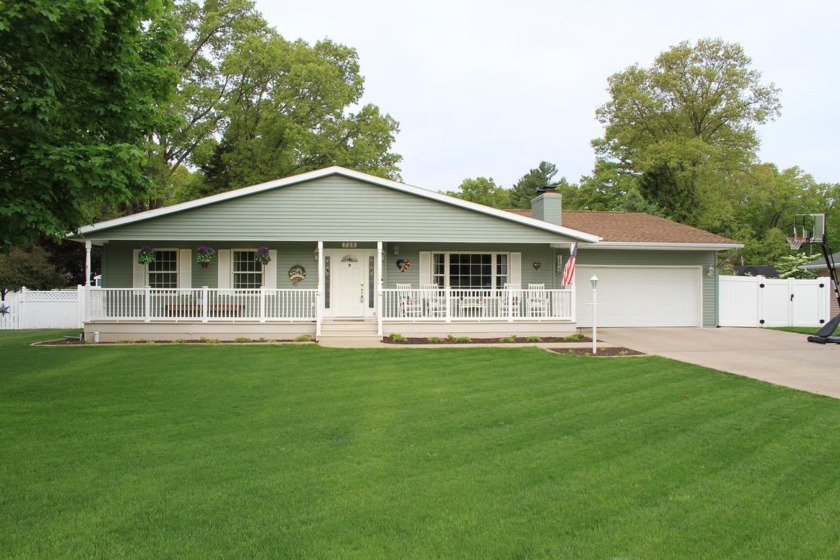 This spacious home has over 3700 finished square feet, including - Beach Home for sale in Muskegon, Michigan on Beachhouse.com