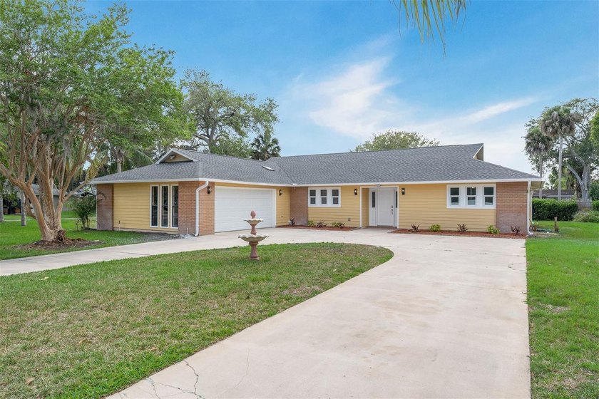 Welcome home to 716 Green Rd, a truly rare find nestled in the - Beach Home for sale in New Smyrna Beach, Florida on Beachhouse.com