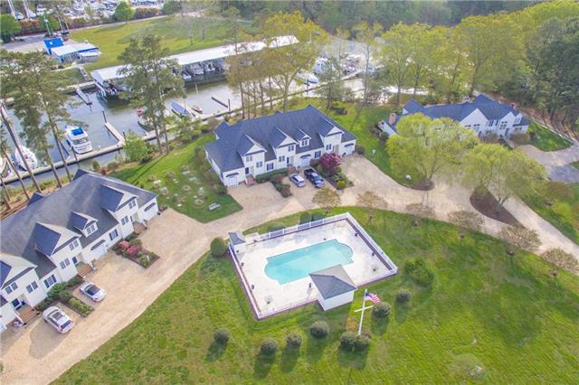 Enjoy first-floor living with sweet views of Fishing Bay in this - Beach Home for sale in Deltaville, Virginia on Beachhouse.com