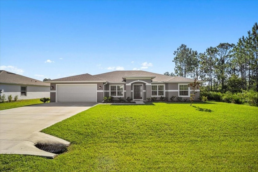 Welcome to this stunning Seagate home, built in 2022, located in - Beach Home for sale in Palm Coast, Florida on Beachhouse.com