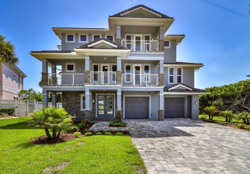 Welcome to this magnificent custom-built 3-story home in the - Beach Home for sale in Flagler Beach, Florida on Beachhouse.com