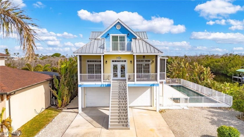 As you enter this unique custom home you will be surrounded by - Beach Home for sale in St. James City, Florida on Beachhouse.com