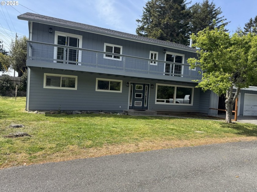 Nestled in the heart of scenic Gold Beach Oregon, just steps - Beach Home for sale in Gold Beach, Oregon on Beachhouse.com