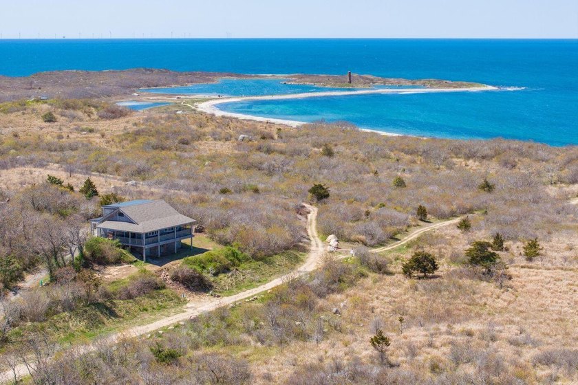 Perched high above the harbor on one of New England's most - Beach Home for sale in Cuttyhunk, Massachusetts on Beachhouse.com