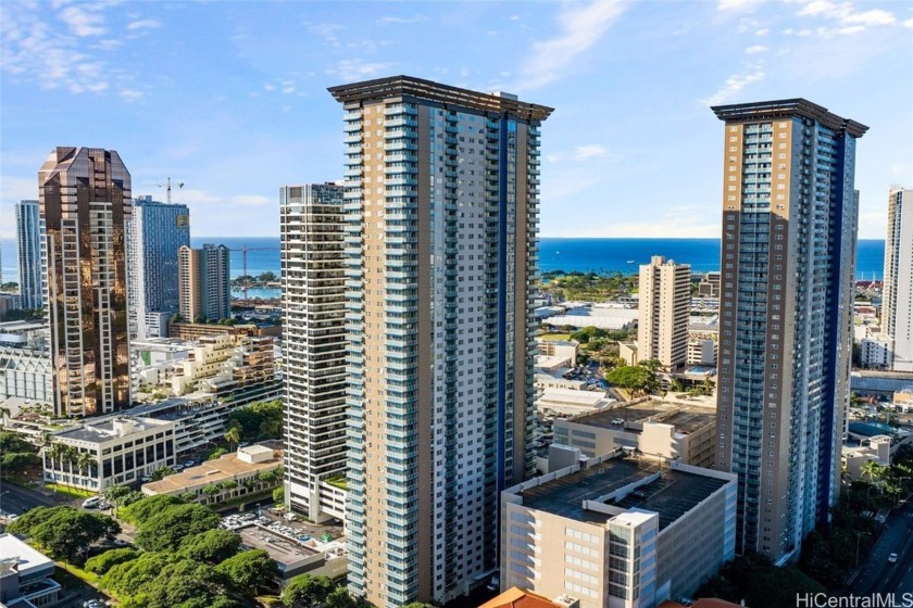 Discover this stunning 2-bedroom, 2-bath corner unit in Building - Beach Condo for sale in Honolulu, Hawaii on Beachhouse.com