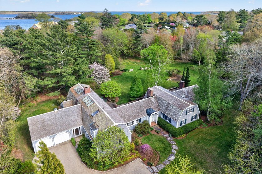 Set on 1.6 acres of private, park-like grounds in the heart of - Beach Home for sale in Marion, Massachusetts on Beachhouse.com