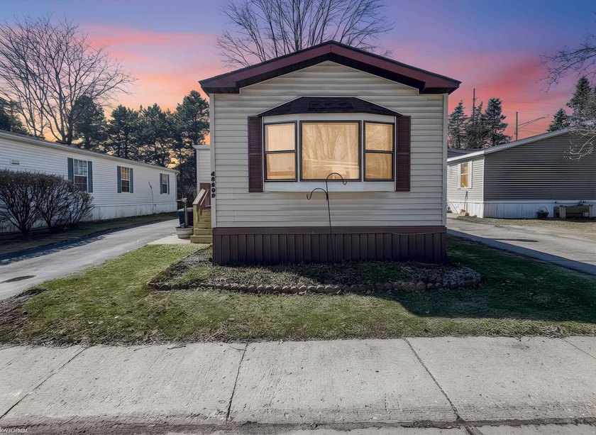 Welcome to your cozy two-bedroom, two-bathroom manufactured home - Beach Home for sale in Shelby, Michigan on Beachhouse.com