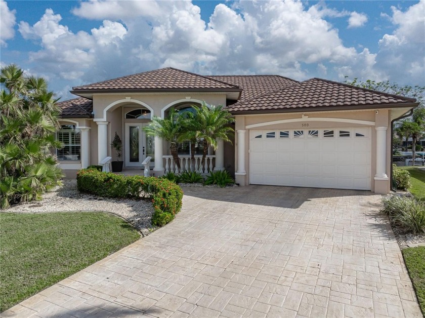 CUSTOM WATERFRONT HOME IN BSI ON KEY LOT W/**NEW METAL TILE - Beach Home for sale in Punta Gorda, Florida on Beachhouse.com