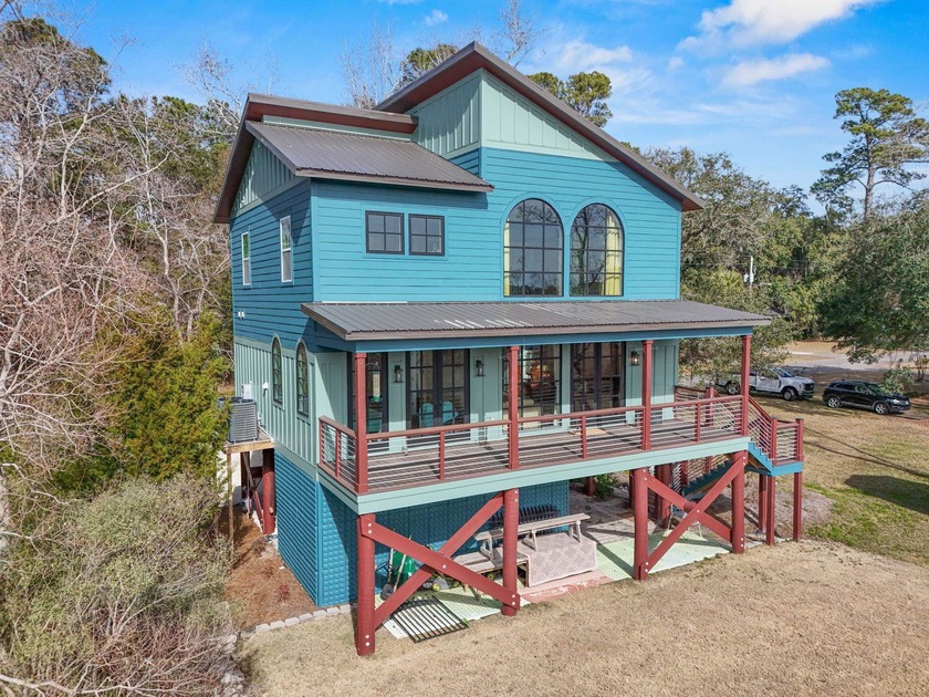 Experience unmatched marsh and water views in this - Beach Home for sale in Georgetown, South Carolina on Beachhouse.com