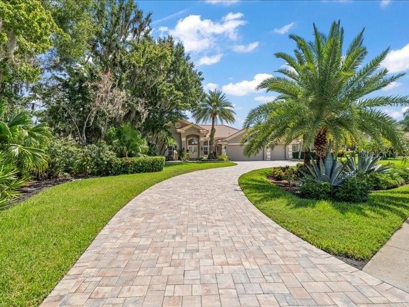 Experience the epitome of luxury living in this exceptional golf - Beach Home for sale in Oldsmar, Florida on Beachhouse.com