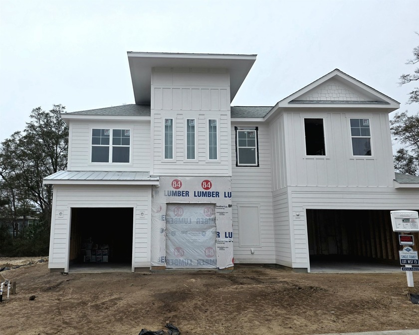 The St. Thomas floor plan offers a two-story design with - Beach Home for sale in Calabash, North Carolina on Beachhouse.com