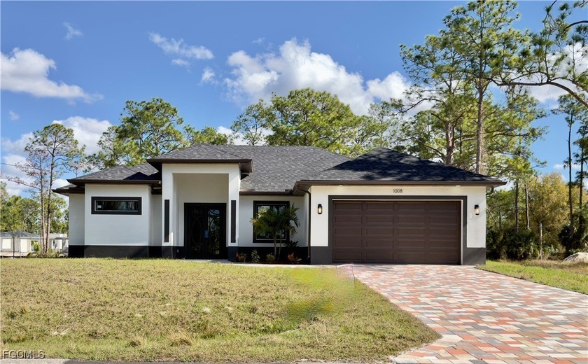 **New Construction on Half-Acre Lot!** This stunning 3-bedroom - Beach Home for sale in Lehigh Acres, Florida on Beachhouse.com