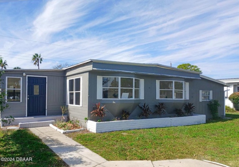 This spacious manufactured home is ready for new owners with 3 - Beach Home for sale in Port Orange, Florida on Beachhouse.com