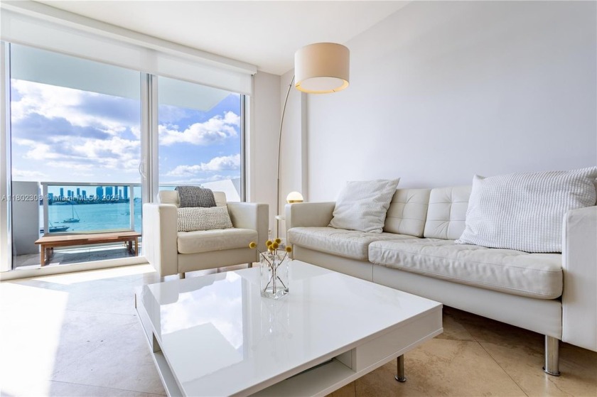 Experience luxury waterfront living in this fully furnished - Beach Condo for sale in Miami Beach, Florida on Beachhouse.com