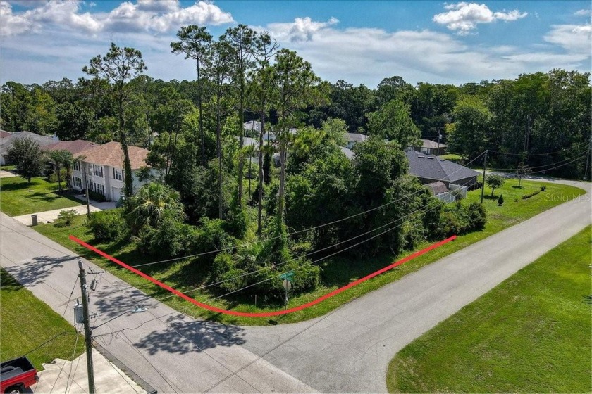 Discover the perfect corner lot in the desirable Quail Hollow - Beach Lot for sale in Palm Coast, Florida on Beachhouse.com