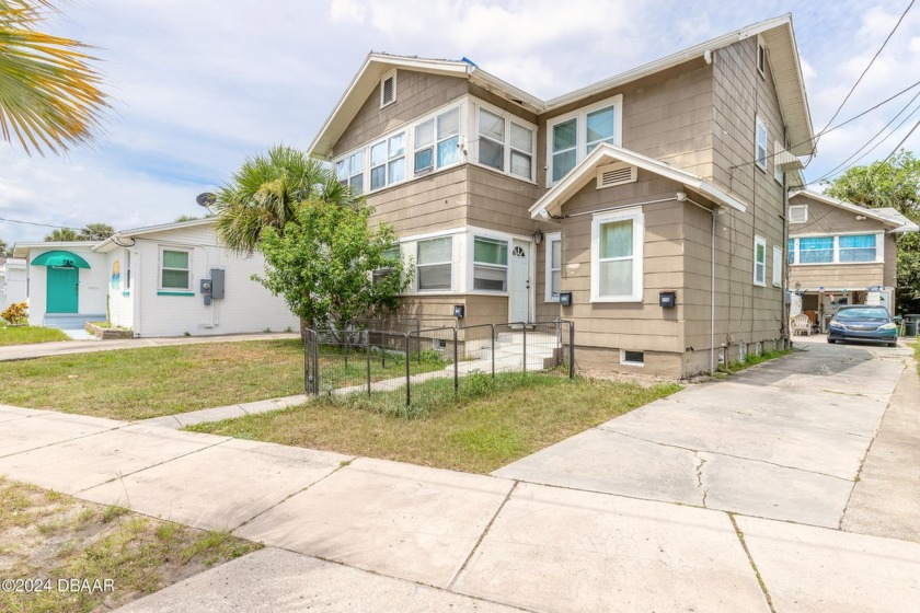 Now w/NEW ROOF or Roof Credit w/accepted offer. Fully Occupied - Beach Townhome/Townhouse for sale in Daytona Beach, Florida on Beachhouse.com