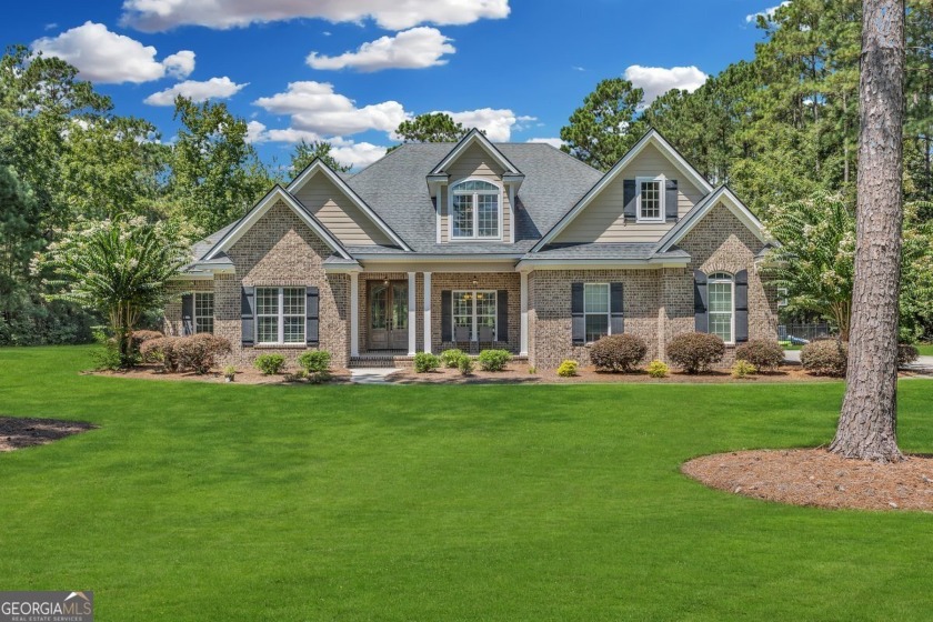 Beautifully updated and move-in ready, this spacious 5-bedroom - Beach Home for sale in Richmond Hill, Georgia on Beachhouse.com