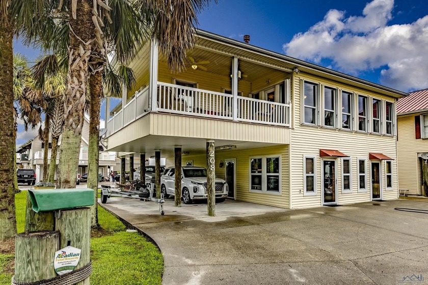 Not your ordinary camp!! This home has luxury details that - Beach Home for sale in Theriot, Louisiana on Beachhouse.com