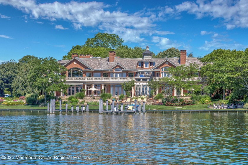 Poised on the Manasquan River, this extraordinary gated mansion - Beach Home for sale in Brielle, New Jersey on Beachhouse.com