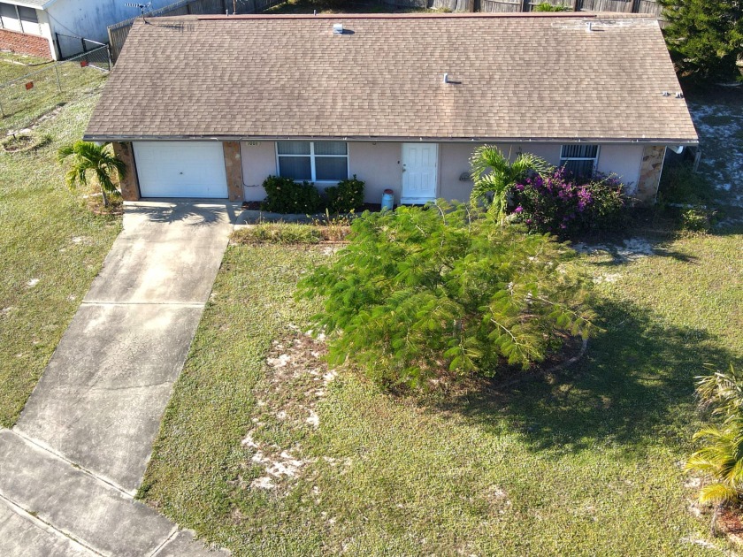 This 2 bed, 2 bath concrete charmer sits on a spacious corner - Beach Home for sale in Palm Bay, Florida on Beachhouse.com