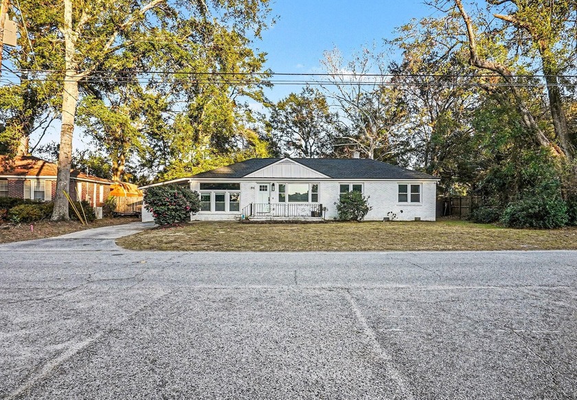 Welcome to 818 W Madison Avenue, a fully renovated white-painted - Beach Home for sale in Charleston, South Carolina on Beachhouse.com
