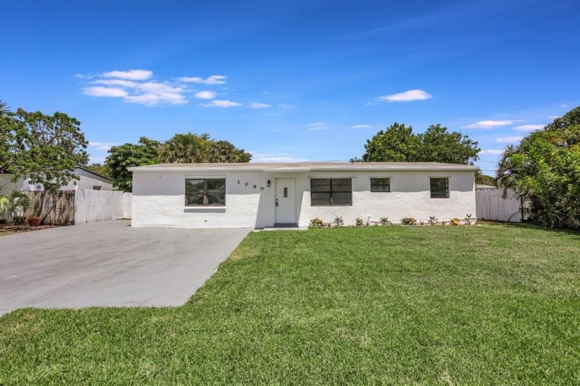 Beautiful Remodeled 3/2 with an open floorplan, Laundry Room - Beach Home for sale in Pompano Beach, Florida on Beachhouse.com