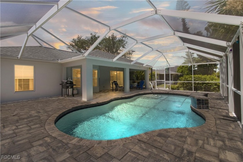 This home is full of WOW-inside and out! A spacious lanai - Beach Home for sale in Cape Coral, Florida on Beachhouse.com