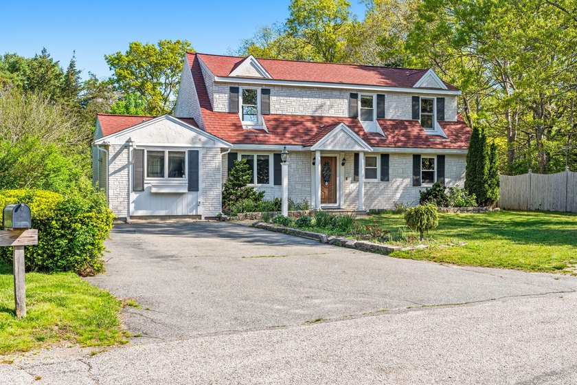 Spacious and full of potential, this expanded East Falmouth Cape - Beach Home for sale in Teaticket, Massachusetts on Beachhouse.com