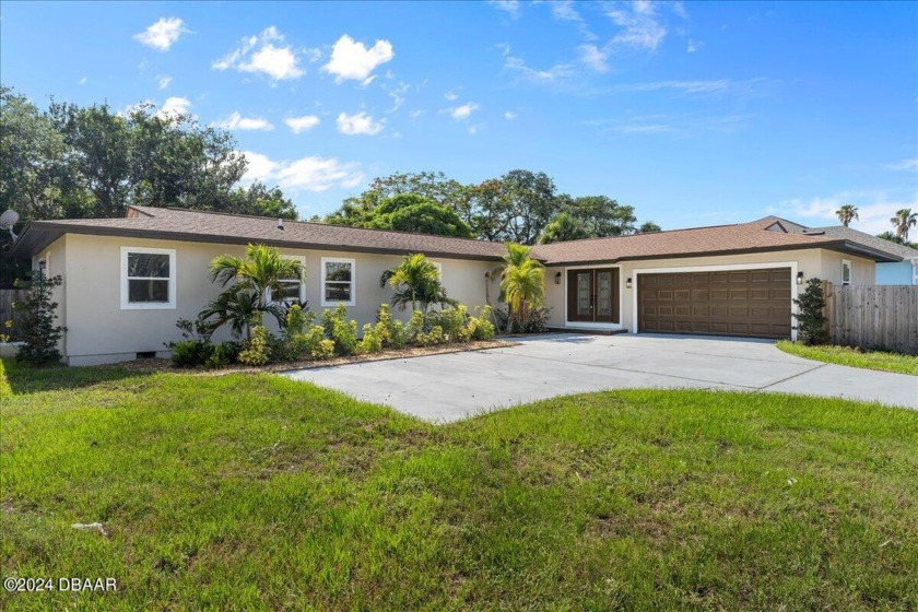 Discover the epitome of beachside elegance in this 4-bedroom - Beach Home for sale in Indian Harbour Beach, Florida on Beachhouse.com