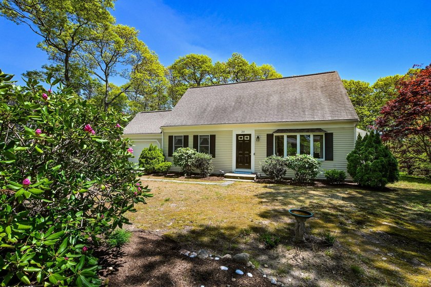 Sunny, bright and spacious 3-bedroom, 2-bath Cape located in the - Beach Home for sale in East Falmouth, Massachusetts on Beachhouse.com