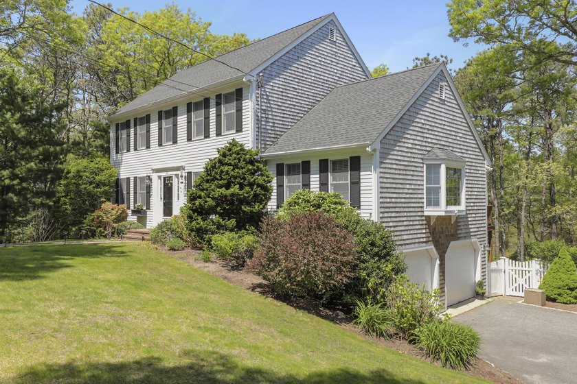 Stunning 3-4 bedroom colonial set back off the street on a pond - Beach Home for sale in Dennis, Massachusetts on Beachhouse.com