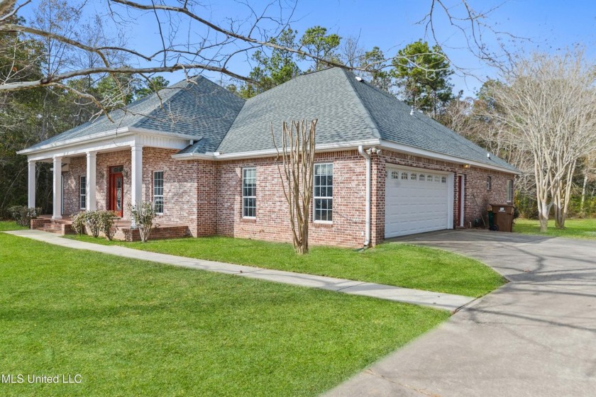Welcome to this stunning 2,600+ square foot home, featuring a - Beach Home for sale in Gulfport, Mississippi on Beachhouse.com