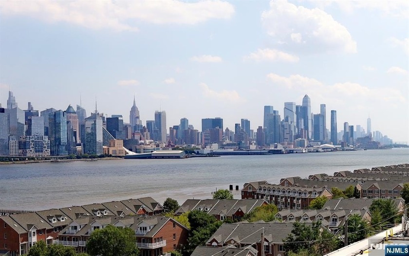 Experience luxury riverfront living with effortless access to - Beach Home for sale in Guttenberg, New Jersey on Beachhouse.com