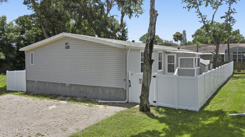 Welcome to this stunning 3-bedroom, 2-bathroom home in Port - Beach Home for sale in Port Orange, Florida on Beachhouse.com