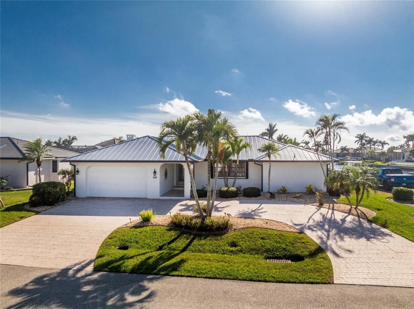 WATERFRONT pool home in Punta Gorda Isles, with intersecting - Beach Home for sale in Punta Gorda, Florida on Beachhouse.com