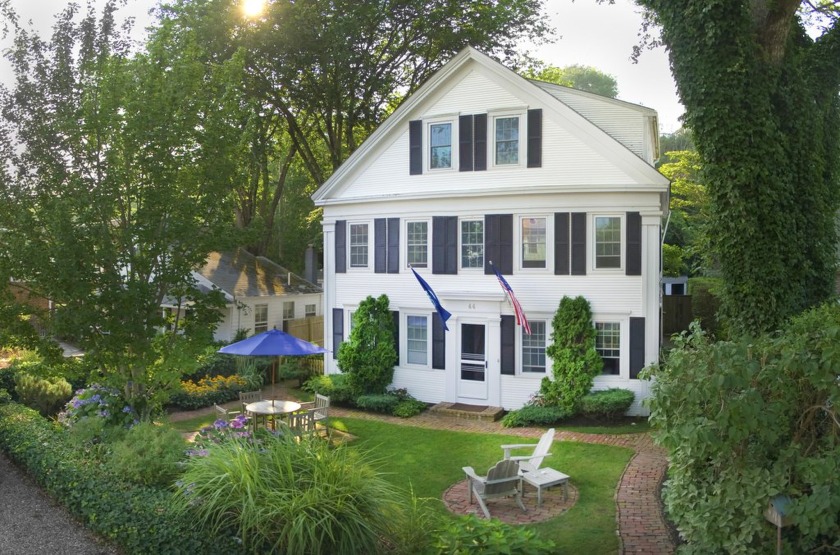 Nestled in the heart of the West End, this historic 1847 Greek - Beach Home for sale in Provincetown, Massachusetts on Beachhouse.com