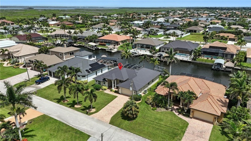 **WITH OVER $150,000 IN UPGRADES, THIS WATERFRONT POOL HOME - Beach Home for sale in Cape Coral, Florida on Beachhouse.com