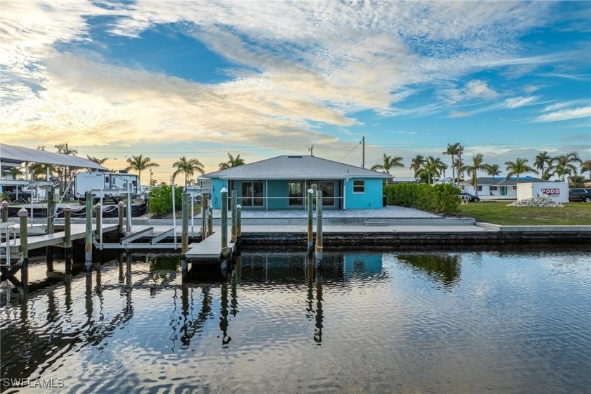 Discover the charm of this adorable CBS home nestled on a - Beach Home for sale in St. James City, Florida on Beachhouse.com