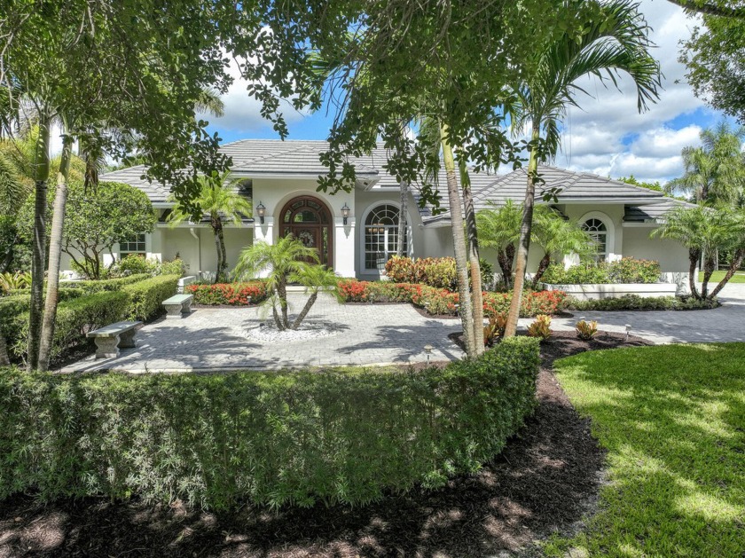 Discover unparalleled luxury and tranquility in this stunning - Beach Home for sale in Palm Beach Gardens, Florida on Beachhouse.com