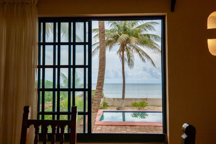 This beautiful beachfront villa in Puerto Morelos offers more - Beach Home for sale in Puerto Morelos,  on Beachhouse.com