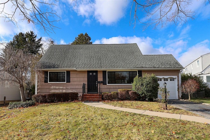 Welcome to this charming Cape-style home located in the coveted - Beach Home for sale in Oyster Bay, New York on Beachhouse.com