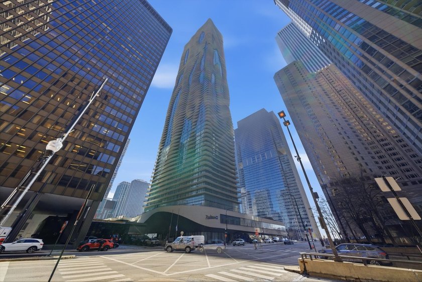 Highly upgraded and professionally designed, this 2-bedroom + - Beach Condo for sale in Chicago, Illinois on Beachhouse.com