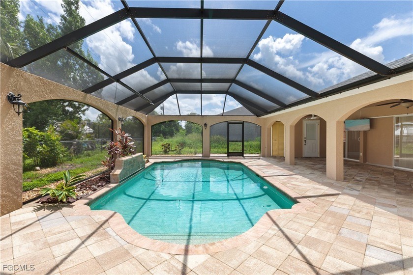 SPACIOUS 3 Bedroom, 2.5 Bathroom, 2 Car Garage, Pool home with a - Beach Home for sale in Cape Coral, Florida on Beachhouse.com