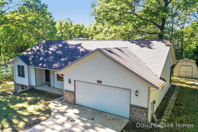 Charming 3-Bedroom Ranch in a Serene Wooded Setting. Welcome to - Beach Home for sale in Holland, Michigan on Beachhouse.com