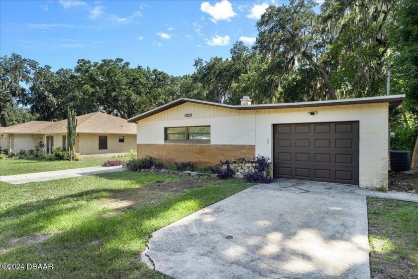 Discover this adorable 4-bedroom, 2-bathroom home in Daytona - Beach Home for sale in Daytona Beach, Florida on Beachhouse.com